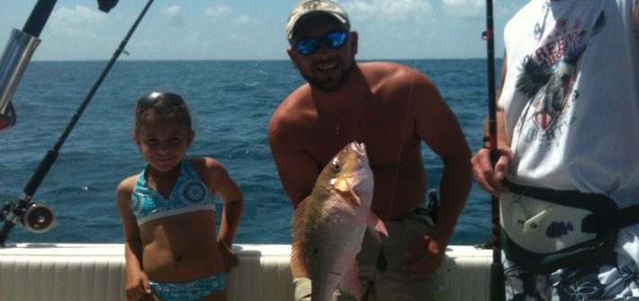 Meiling and Bob with a mutton snapper caught on a wreck in 160ft off Marathon