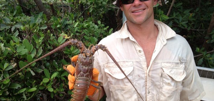 Jeff is showing off this lobster he caught off Marathon in the Fl Keys.