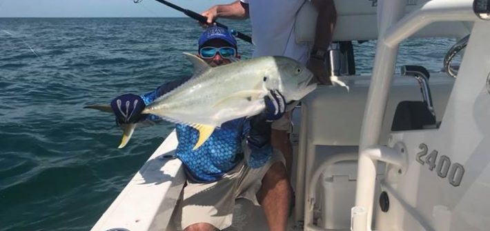 Tarpon fishing the Seven Mile bridge. This jack had a little remora that hung ar…