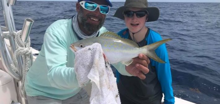 Miles first yellowtail snapper and first time saltwater fishing. This was from o…